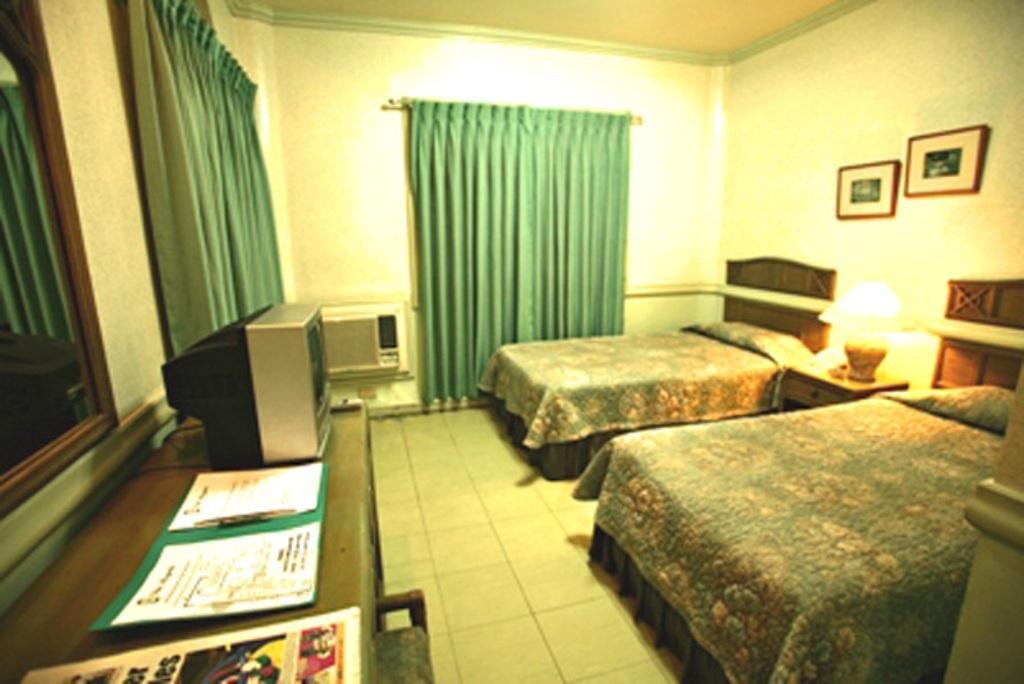 Villa Margarita Hotel Davao Номер фото